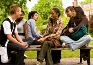 group of students sitting outside